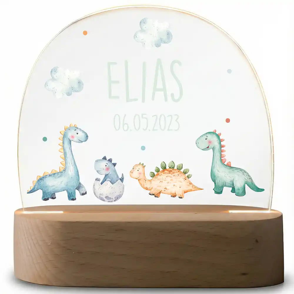 Veilleuse enfant personnalisée Bébés dinos – plaque en acrylique posée sur le socle ovale en hêtre
